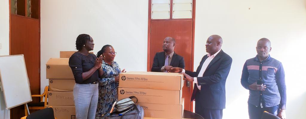 Mukono District Donates 12 Computers to Namuganga SSS to Boost ICT Learning and Community Empowerment.