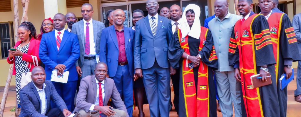 The Minister for Local Government, Hon. Raphael Magyezi in agroup photo with  the Leaders of Greater Mukono 